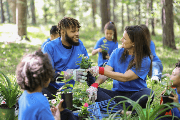 Volunteers taking part in a tree plantation campaign